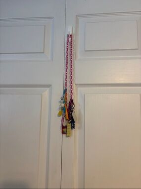 Vintage 80s Plastic bell clip on necklace
